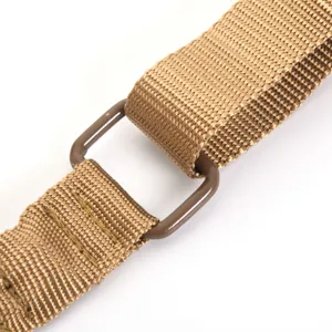 Close-up of tactical sling hardware and durable coyote brown nylon webbing texture