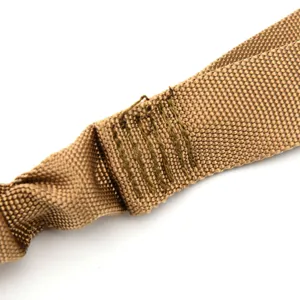 Tactical bungee safety rope detail close-up, durable nylon webbing with reinforced stitching.