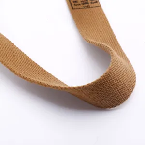 Detailed macro shot showing the durable woven texture of the khaki tactical strap