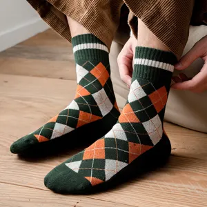 Thick warm men's argyle crew socks with soft terry lining for a cozy winter season