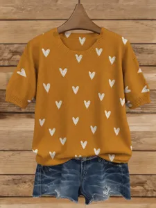 Vintage senfgelber Kurzarmpullover mit weißem Herzmuster