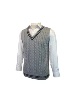 Detailed view of grey cable-knit V-neck sweater vest over a white shirt