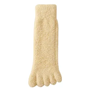 Soft coral fleece five-toe socks for women in a warm light yellow fuzzy texture.