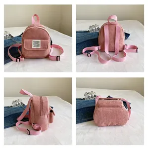 Comprehensive four-angle views of a stylish pink corduroy mini backpack for women's use.