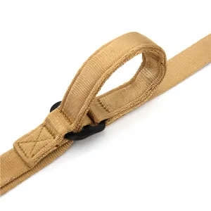 Detailed view of khaki tactical rifle sling, durable nylon strap with adjustable buckle.