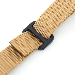 Tactical sling strap detail, durable nylon webbing with adjustable black plastic buckle.