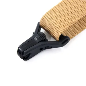 Tactical sling strap detail featuring durable nylon webbing and quick-release buckle.