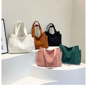 Collezione di borse tote in velluto a coste per donna in vari colori alla moda