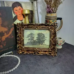 Vintage ornate photo frame European style gold decorative picture frame for home desktop decor.