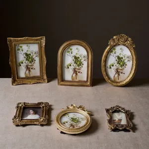 Set of vintage gold French court style relief resin picture frames with classic artwork