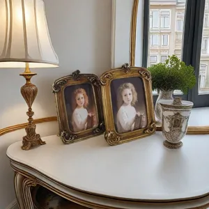 Vintage gold resin photo frames with ornate French carvings for elegant home decor
