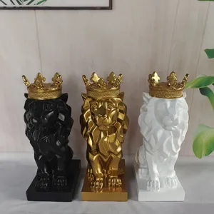 Detailed view of modern geometric lion resin statues with crowns, perfect living room decor.