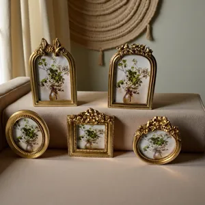 Kollektion europäischer goldener Vintage-Harzrahmen mit kunstvollen Blumen-Schnitzereien