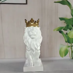 Detail shot of a white resin lion ornament with gold crown for elegant desktop decor.