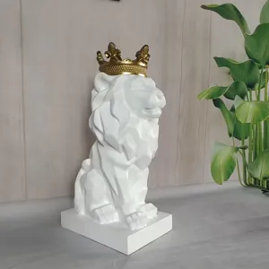 Geometric lion statue detail shot, white resin sculpture with gold crown for modern decor.