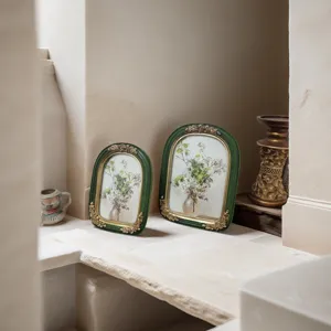 Vintage French resin picture frames with ornate gold floral details for home decor