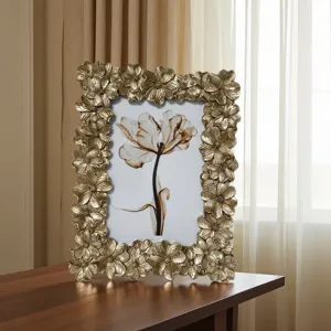 European vintage resin photo frame with floral embossed border for home table decor.