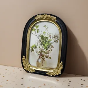 Vintage French style resin picture frame with elegant gold floral relief details