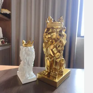 Resin geometric lion crown sculpture detail view, luxury desktop home decor ornament closeup.