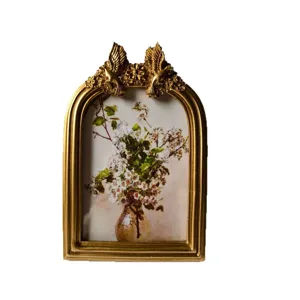 Vintage europäischer goldener Bilderrahmen aus Harz mit Vogel- und Blumendekor