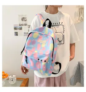 Stylish pastel gradient school backpack for girls featuring a decorative metal chain