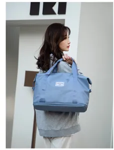 Bolso de viaje azul de gran capacidad para deporte con una separación húmedo-seco