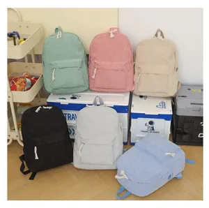 Colección de mochilas de pana multicolores con gran capacidad para uso casual y diario