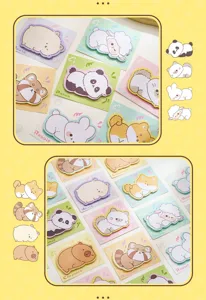 Close-up view of diverse cute animal-shaped sticky notes featuring pandas and capybaras