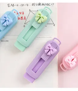Schattige intrekbare gum met strikontwerp, kleurrijk schoolbriefpapier voor kinderen.