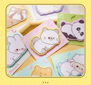 Detailed view of various cute animal-shaped sticky notes in soft pastel colors