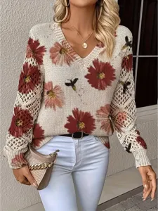Detail shot of V-neck floral knit sweater with elegant bohemian hollow-out sleeves