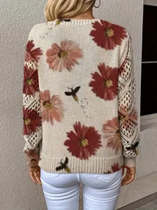 Back view of a bohemian floral knit sweater featuring elegant flower prints and knit details