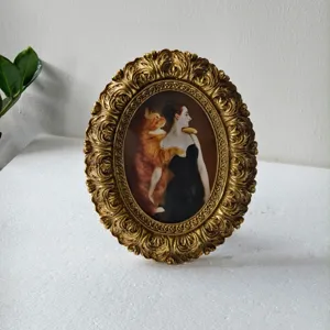 French vintage gold oval embossed picture frame with quirky cat portrait for home decor