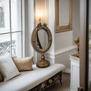 Antique gold carved oval desktop frame in a luxurious French style interior