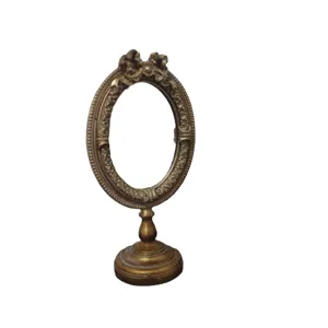 Vintage European carved gold oval photo frame with ornate pedestal stand for desktop