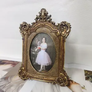 Ornate vintage gold resin photo frame with classical girl portrait for home desk decor