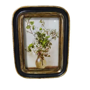 Marco de fotos vintage de resina tallada a mano en negro y oro con arte floral