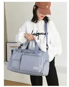 Bolsa de gimnasio azul claro grande con separación seco-húmedo de modelo