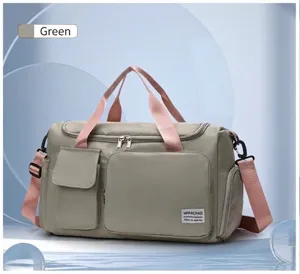 Bolsa de deporte verde y rosa de gran capacidad con múltiples compartimentos