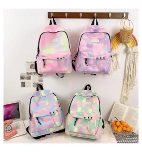 Detailed view of four colorful academic style canvas backpacks with decorative chains