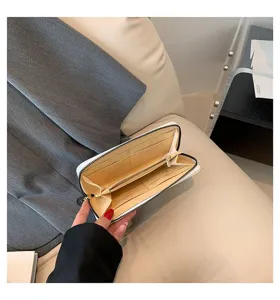 Internal view of a women's long zipper wallet showing card slots and compartments