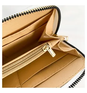 Detailed interior view of women's long wallet with card slots and zipper pocket