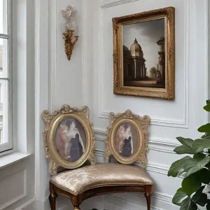 Detailed view of ornate gold vintage resin frames in a classical interior setting.
