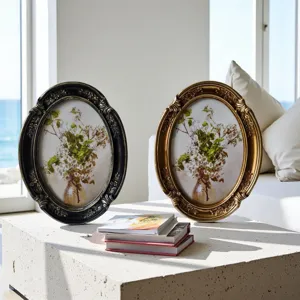 Vintage ornate oval picture frames with gold palace carvings in elegant room setting