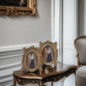Set of ornate gold vintage resin photo frames with baroque carved angel details