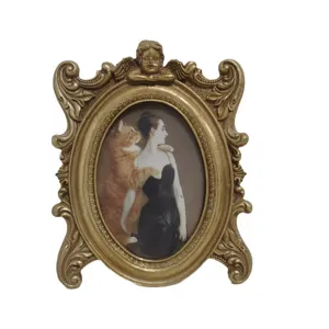 Vintage resin photo frame with ornate carvings and angel figure for classical home decor