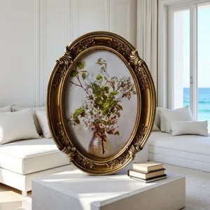 Elegant vintage ornate gold oval photo frame with intricate carvings for home decor