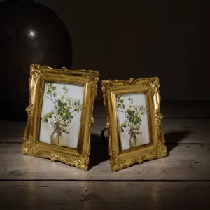 Vintage baroque resin picture frame, gold carved tabletop photo frame detail view.