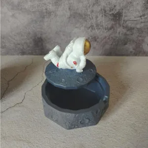 Astronaut moon storage box resin ornament, creative desktop decor for modern living room gift.