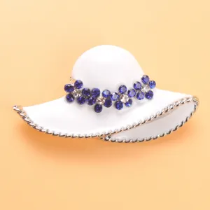 Elegant white wide-brim hat brooch adorned with shimmering blue and clear rhinestones